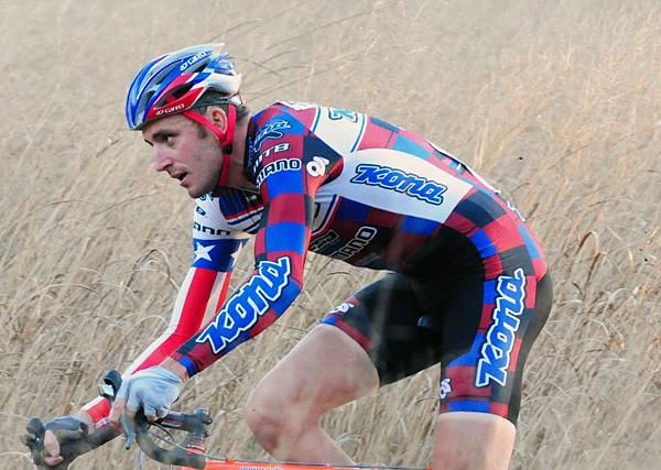 Ryan Trebon (Kona) descending through what looks like a wheat field.