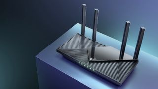 TP-Link Archer AX55 on a table cast in blue light