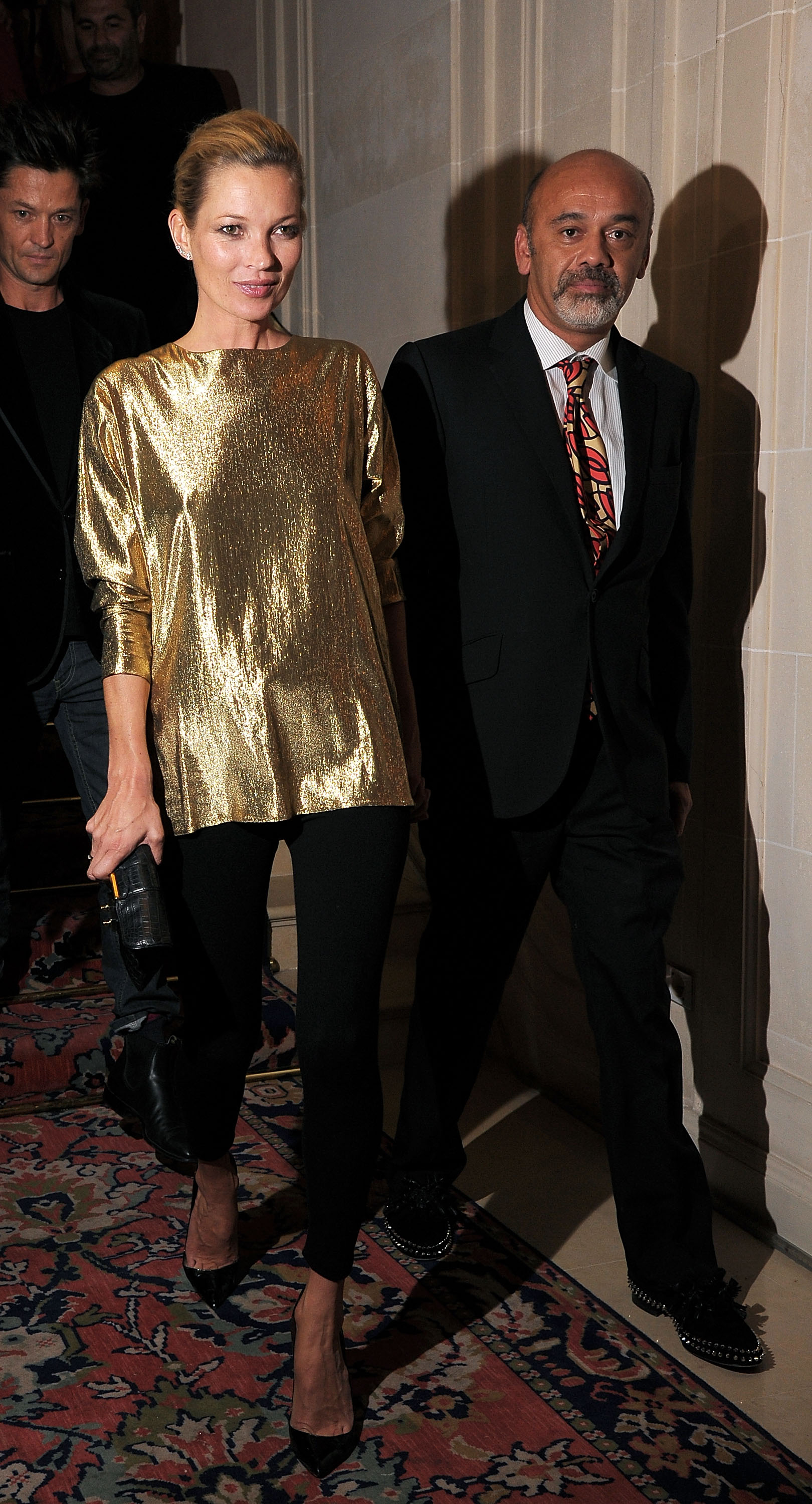 An image of Kate Moss wearing the Christian Louboutin So Kates at an event in 2012.