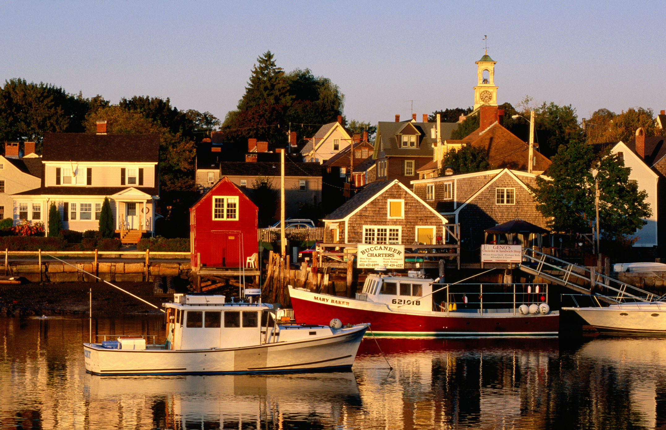 photograph of Portsmouth, New Hampshire, consisting of several houses and boats on the waterfront