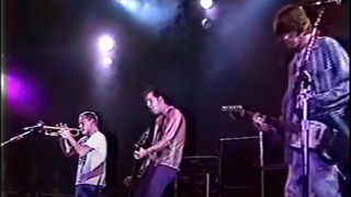 Flea playing trumpet with Nirvana in 1993