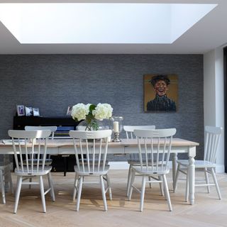 dining room with grey wall and dining table