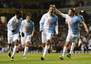 Dimitar Berbatov and his Tottenham team-mates celebrate a goal against Aston Villa in October 2007.