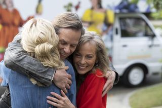 Neighbours characters Mike, Charlene and Jane hugging