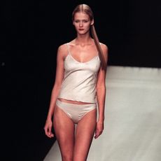 woman wearing tankini on runway 