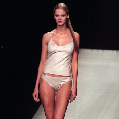 woman wearing tankini on runway