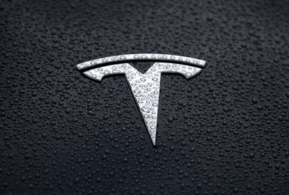 A Tesla logo on a car