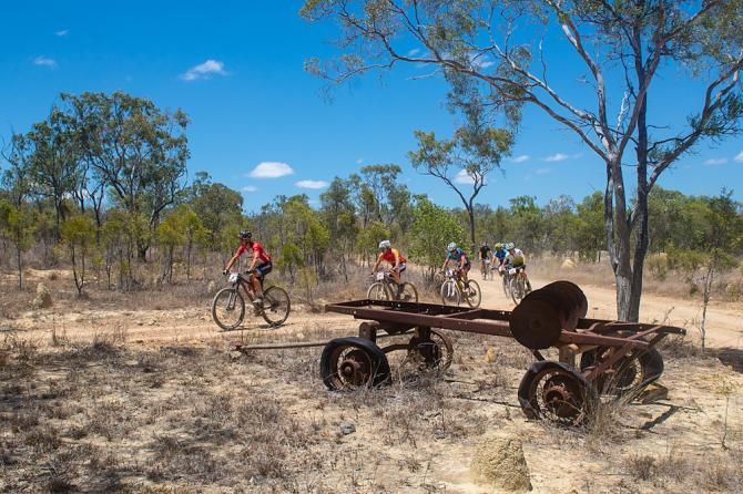 As M&aacute;rton Blazs&oacute; races towards the finish, the chasing group including Cory Wallace, Greg Saw and Milton Ramos works hard