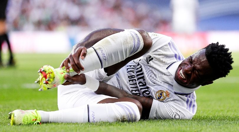 Vinicius Junior down injured in Real Madrid&#039;s LaLiga game at home to Real Betis in September 2022.