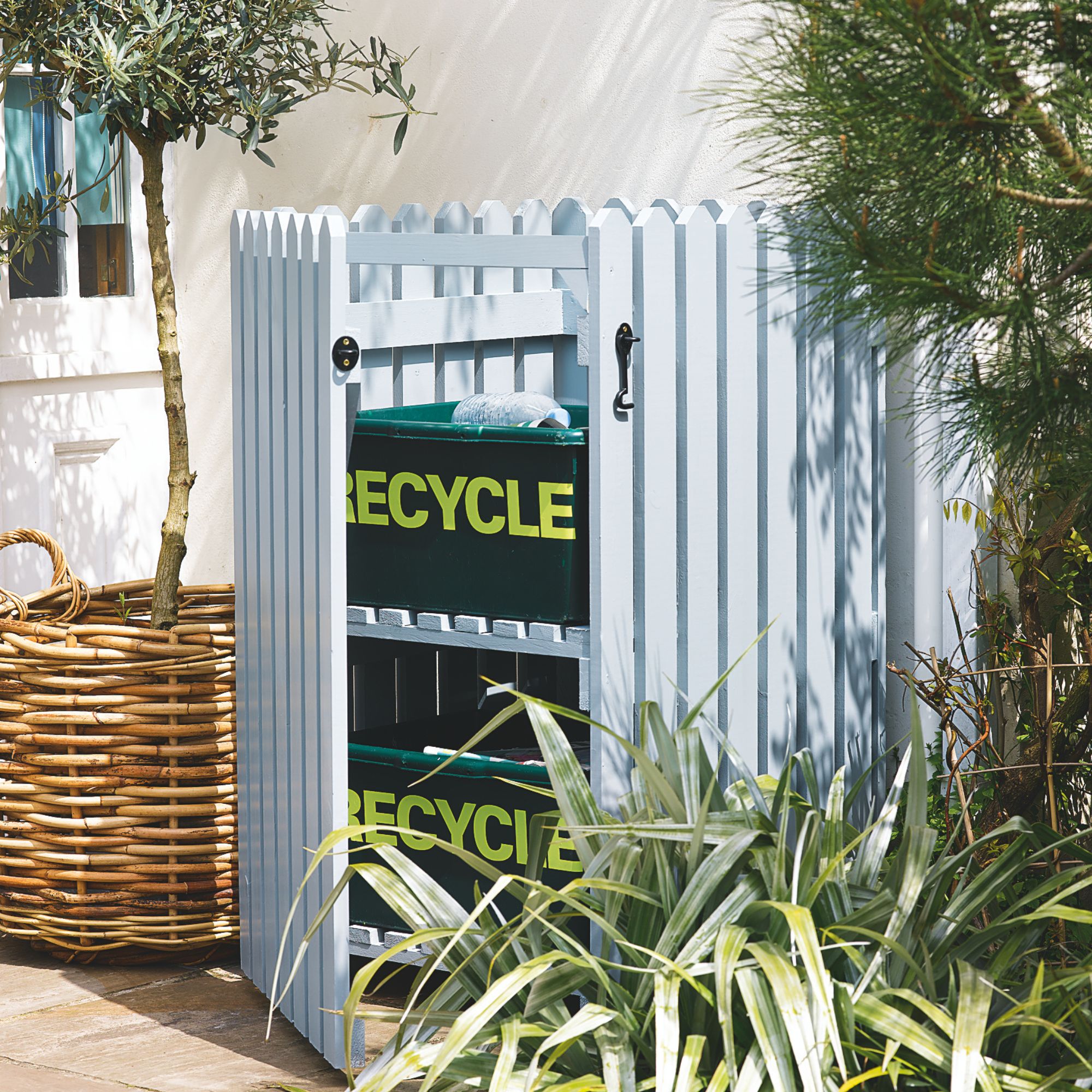 front garden with recycling storage