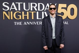 Kim Kardashian and Pete Davidson walk the red carpet for Saturday Night Live's 50th anniversary special