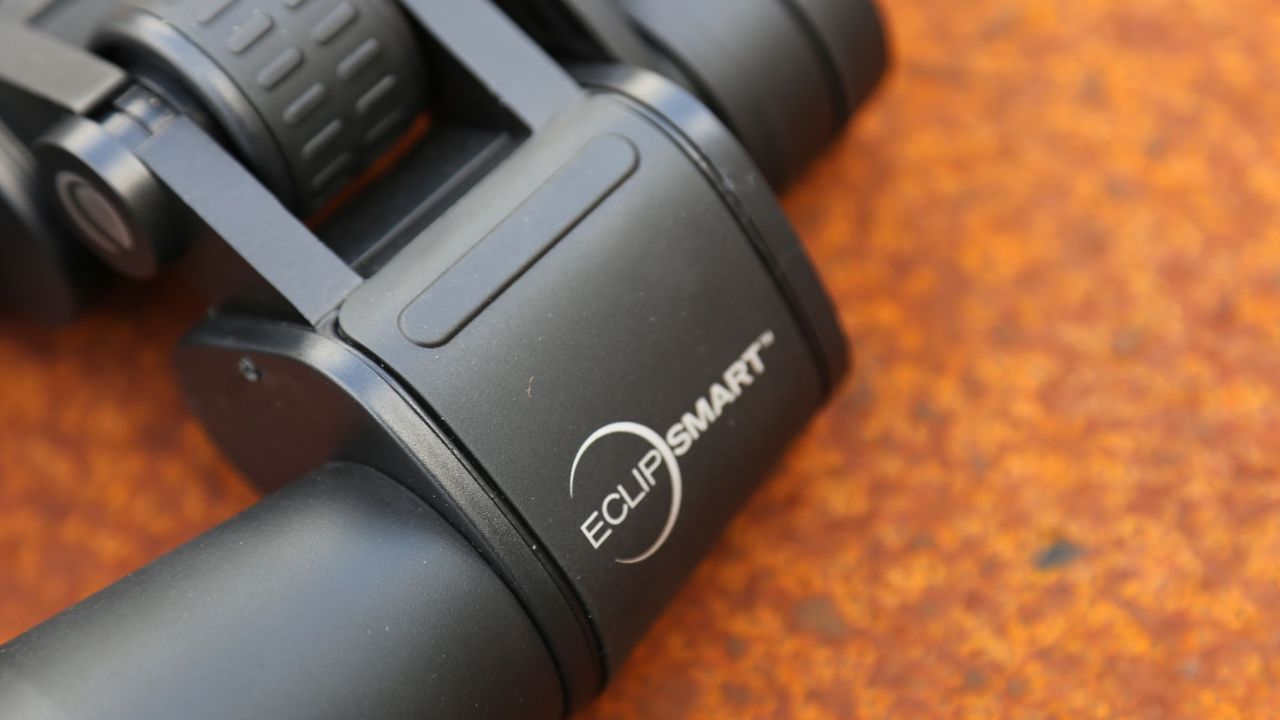 Celestron EclipSmart 20x50mm Porro solar binoculars viewed from one side.