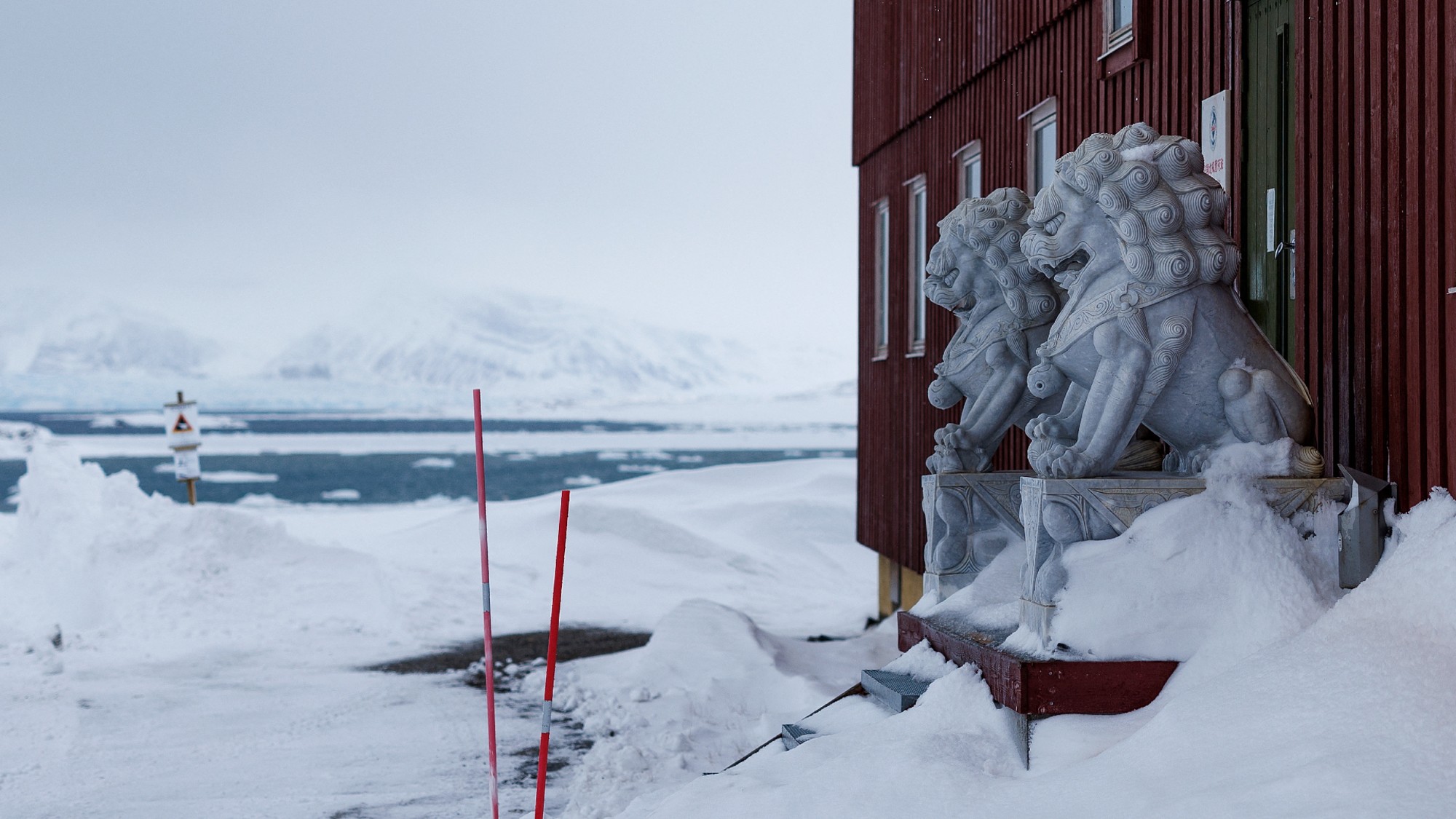 Granite lions in front of the Chinese research station in Svalbard; they were removed earlier this year.
