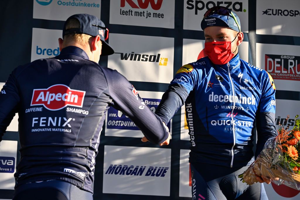 Belgian Tim Merlier of AlpecinFenix and French Florian Senechal of Deceuninck QuickStep pictured on the podium after the Bredene Koksijde Classic one day cycling race of 199 km Friday 19 March 2021 BELGA PHOTO ERIC LALMAND Photo by ERIC LALMANDBELGA MAGAFP via Getty Images