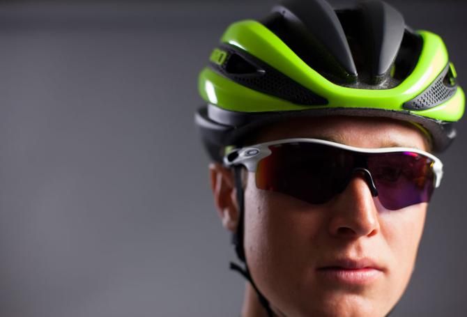 Greg Daniel models the Axeon Cycling Team's headgear.