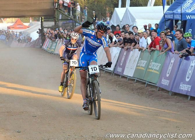 Gerhard Kerschbaumer takes the team relay win for Italy ahead of Maxime Marotte (France)