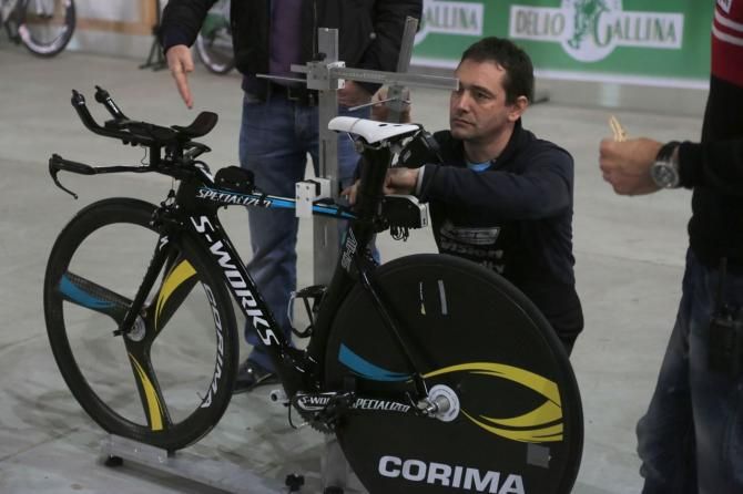 The Astana mechanic works on Nibali's Shiv bike