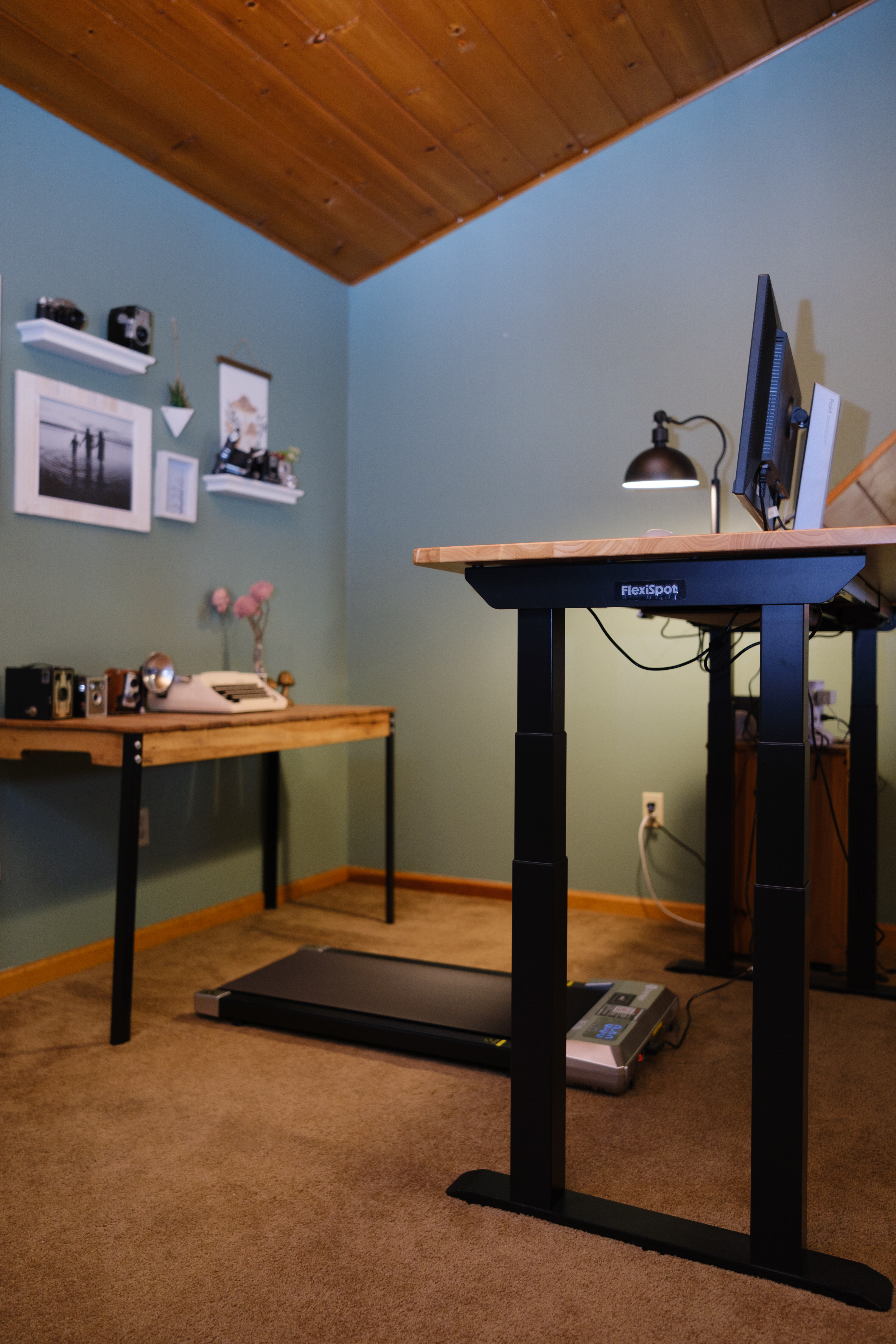A Flexispot E7 Pro Max standing desk in an office