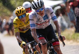 UAE Team Emirates teams Slovenian rider Tadej Pogacar wearing the best young riders white jersey R cycles ahead of JumboVisma teams Danish rider Jonas Vingegaard wearing the overall leaders yellow jersey L in the ascent of Col de Spandelles during the 18th stage of the 109th edition of the Tour de France cycling race 1432 km between Lourdes and Hautacam in the Pyrenees mountains in southwestern France on July 21 2022 Photo by Thomas SAMSON AFP Photo by THOMAS SAMSONAFP via Getty Images