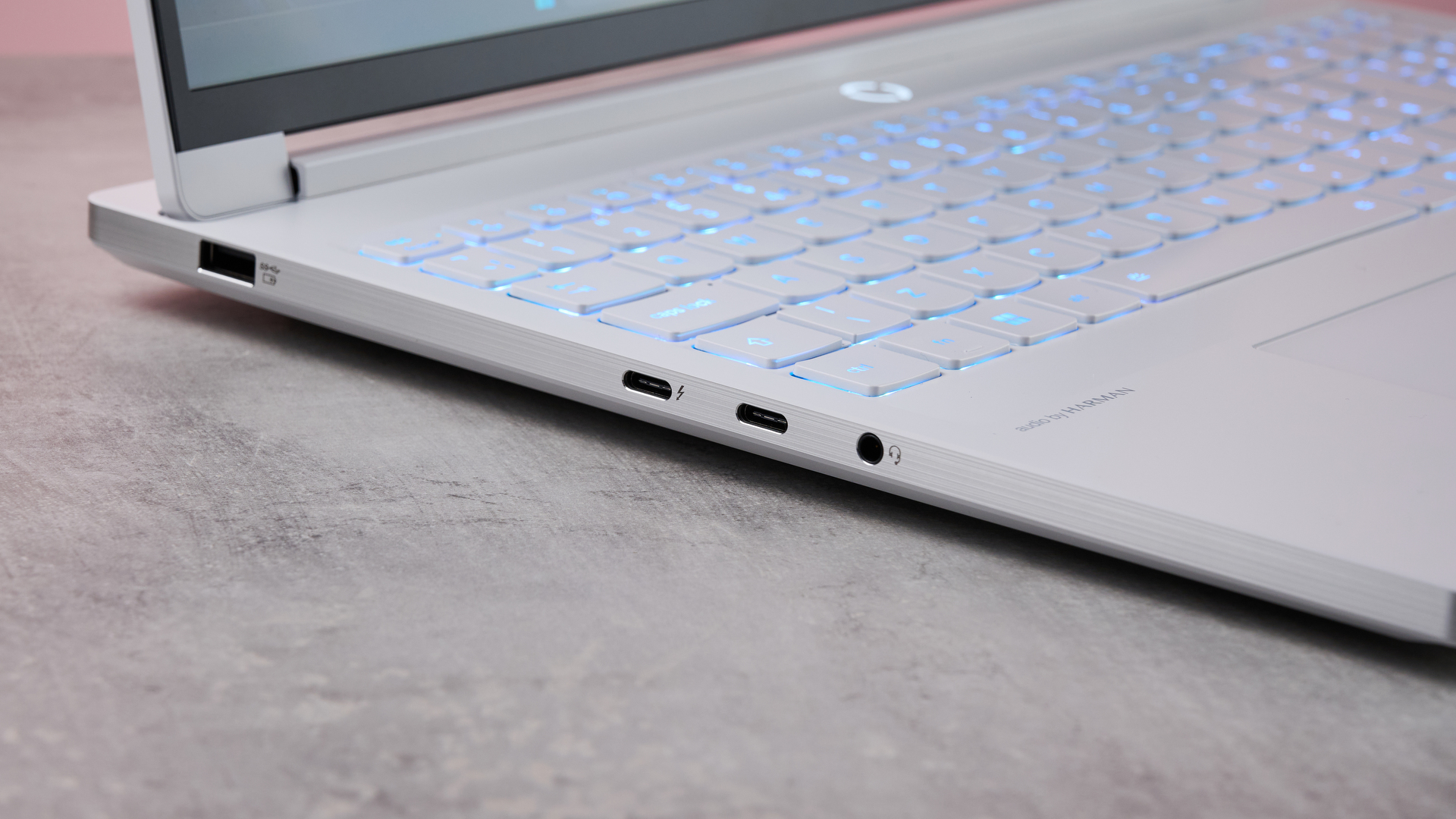 Close-up of left-side ports on Lenovo Legion 7i Gen 10 on desk