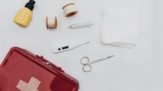 First aid kit with bandages and scissors