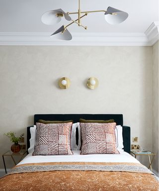 Mayfair apartment bed with wall lights