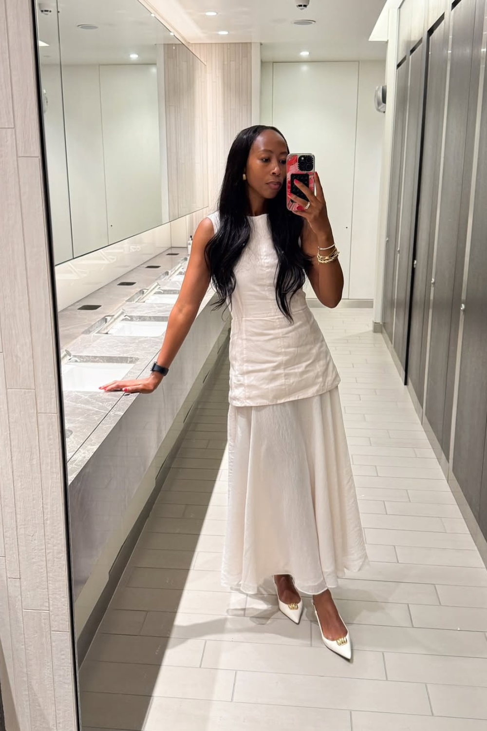 @thandimaq wears white dress white heels
