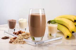 Protein drink with cacao oats nuts flaxseed and banana