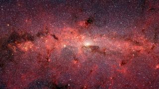 Clouds of red and purple sit on a dark background