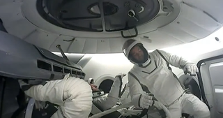 The Dragon crew chills before a historic spacewalk