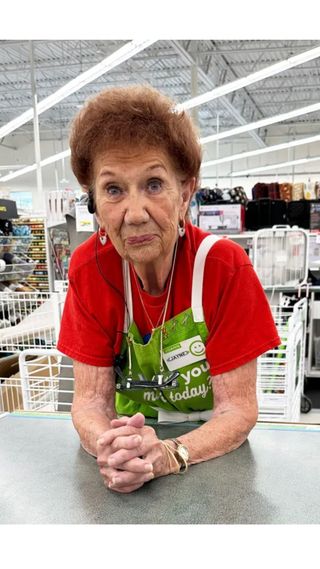 jayne from Jo-Ann stores behind a cash register