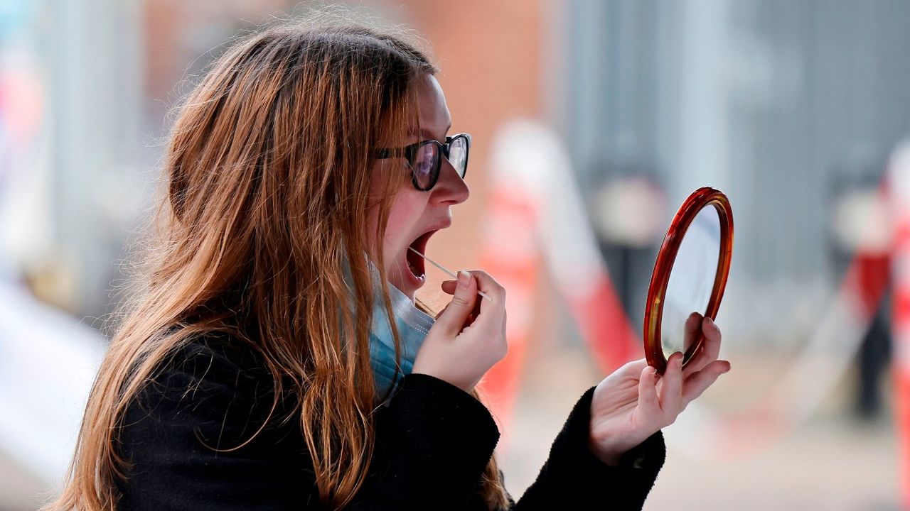 A member of the public takes a Covid-19 test