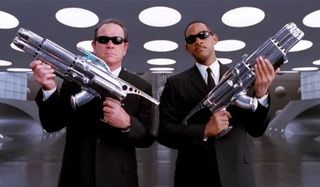 Men In Black Tommy Lee Jones Will Smith armed for action