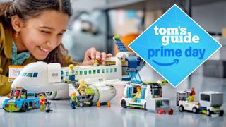 Child playing with a Lego City Passenger Airplane building set