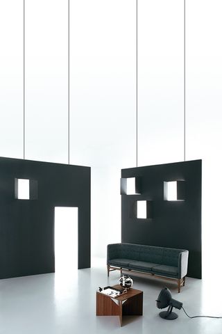 Living room with Ferdinand Kramer table Giò Ponti tableware Arne Jacobsen sofa and Le Corbusier light