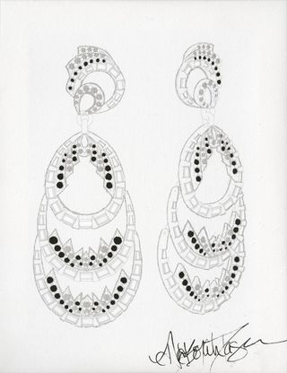 Hanging chandelier earrings with black stones with an autograph of the designer