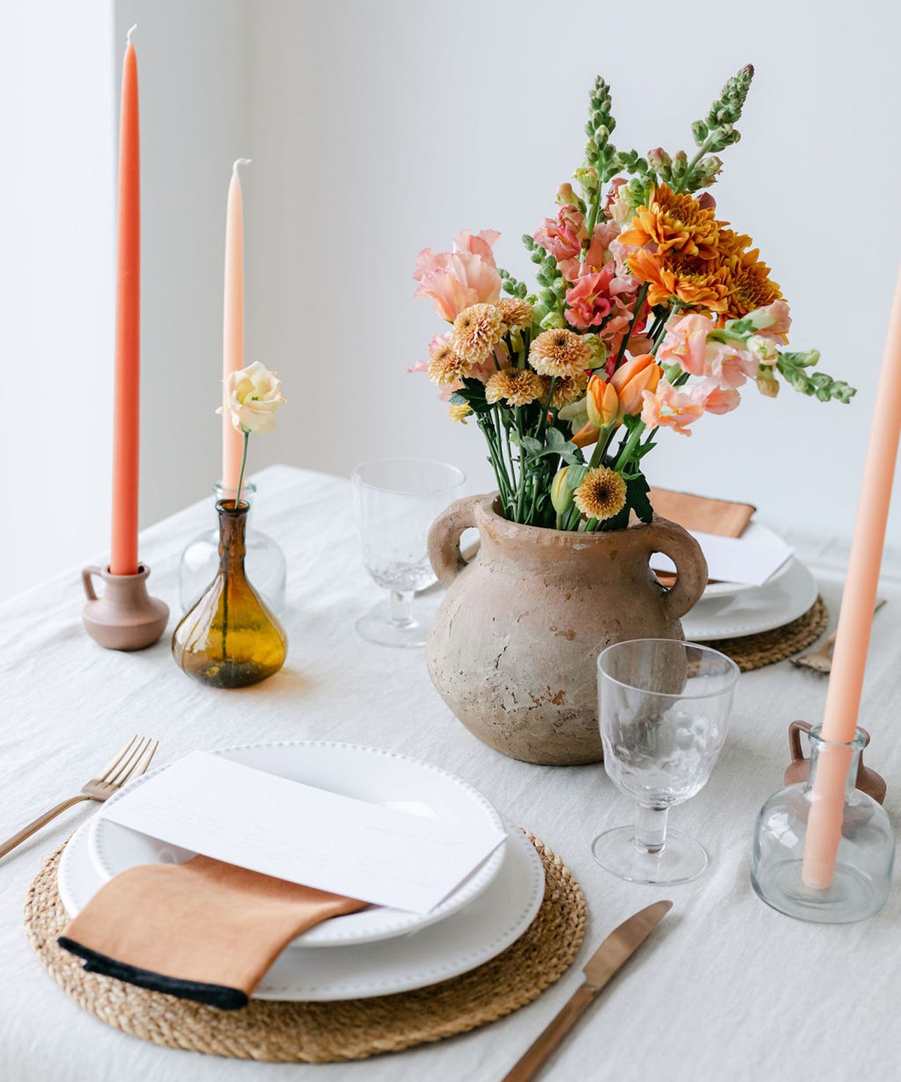 Seasonal tablescape with pretty coral accents