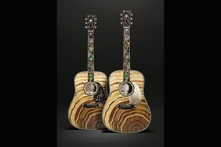 A photo of Martin's D-300 (left) and D-3 Millionth models designed to celebrate the company's 3 millionth guitar. These guitars made their debut at the 2025 NAMM show.