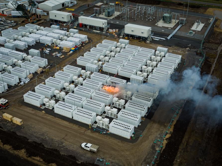 An image of a Tesla battery on fire