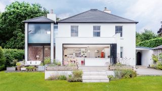 A home covered with crisp white render