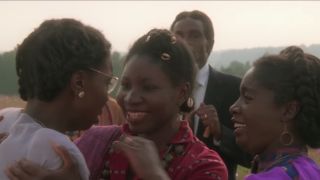 Celie reuniting with her family in The Color Purple.