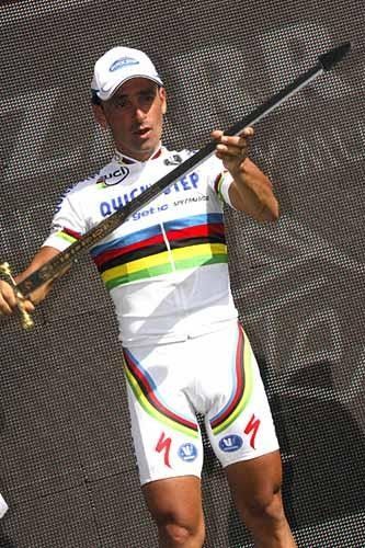 Give me my long sword: Paolo Bettini (Quick Step) shows off his new silverware of a different nature.