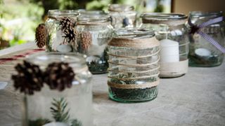 pictures of mason jars with festive decorations on and in them