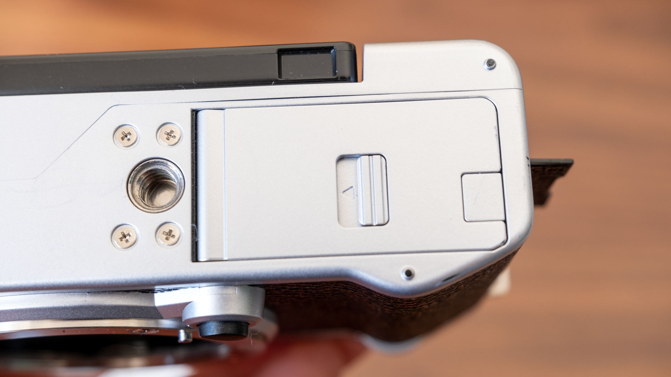 The closed battery compartment of the Fujifilm X-M5.