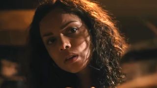 Georgina Campbell peeking around a corner in Barbarian
