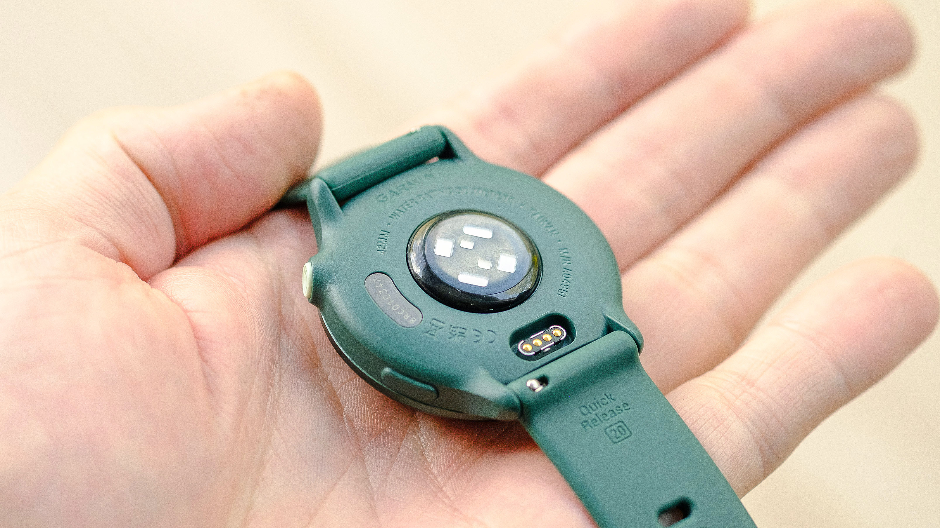 Close-up of the Garmin Vivoactive 6 smartwatch in green