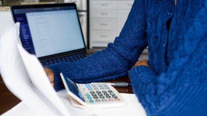 Person looking at tax forms