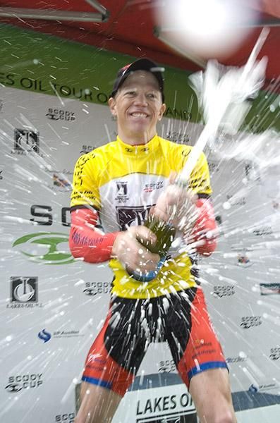 Cop this: New tour leader Patrick Shaw (Virgin Blue/RBS Morgan) from Victoria sprays the champers in Newborough.