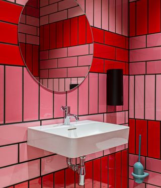 Pink tiled bathroom wall