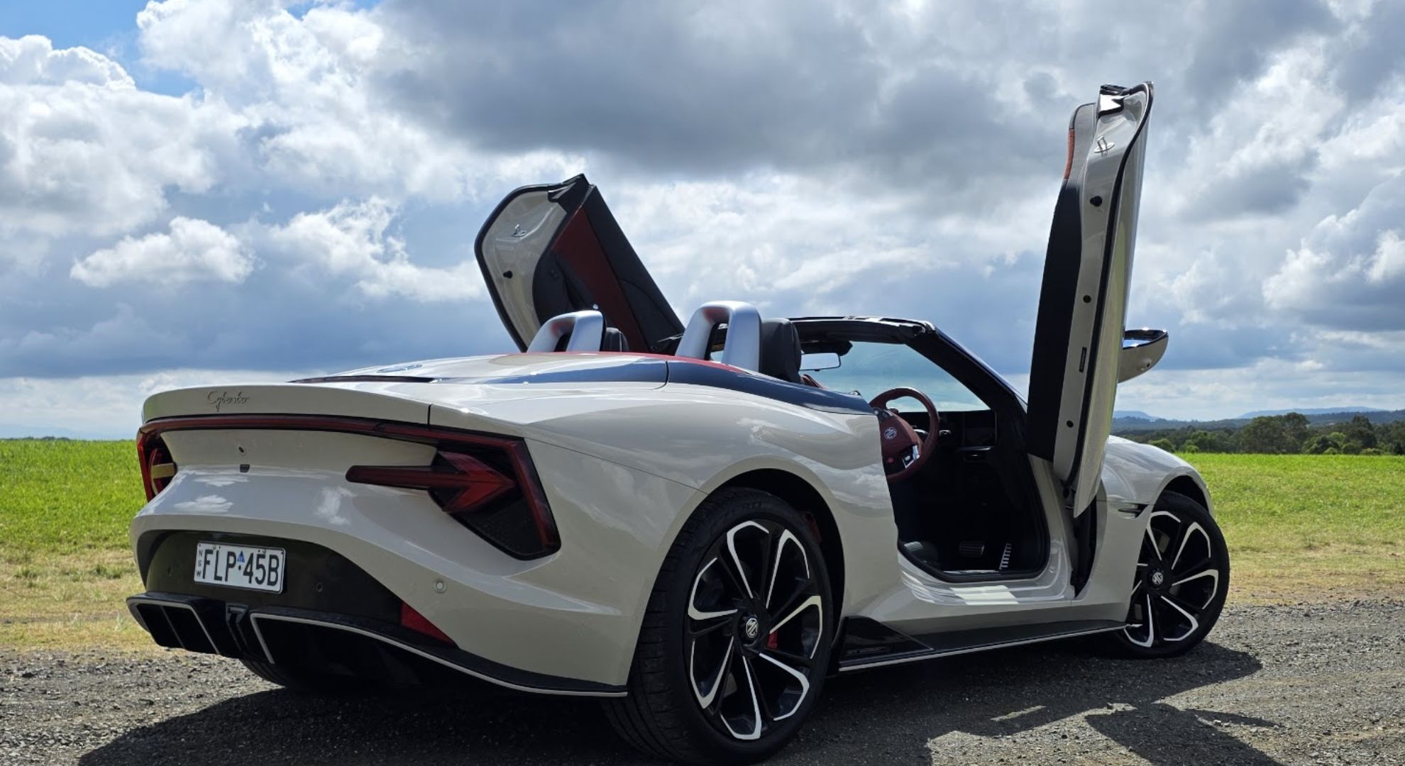 The MG Cyberster from the back with its doors open